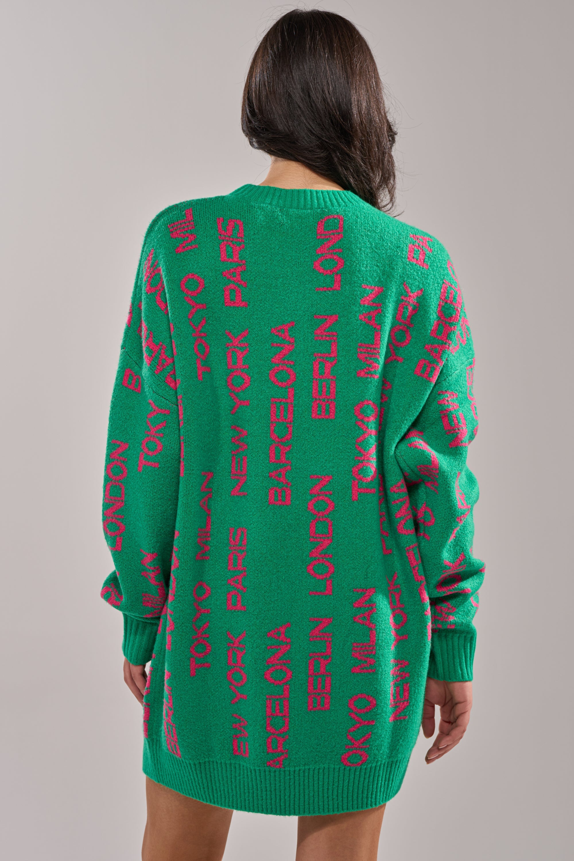 AROUND THE WORLD SWEATER MINI DRESS IN GREEN